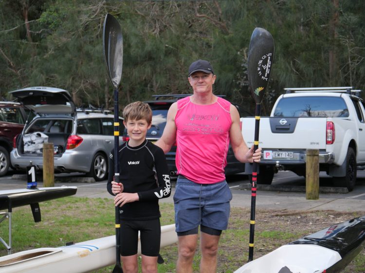 Father and son after kayak race